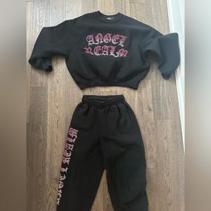 Black sweatsuit with rhinestones